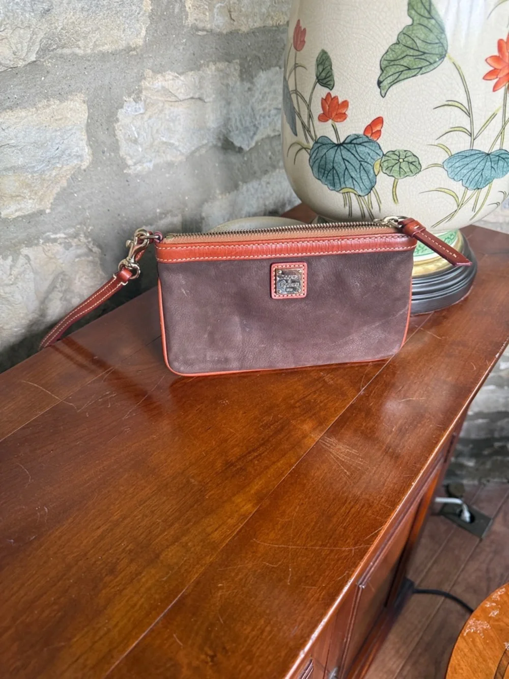 Dooney & Bourke Brown and Orange Leather-Trim Wristlet - Picture 1 of 5